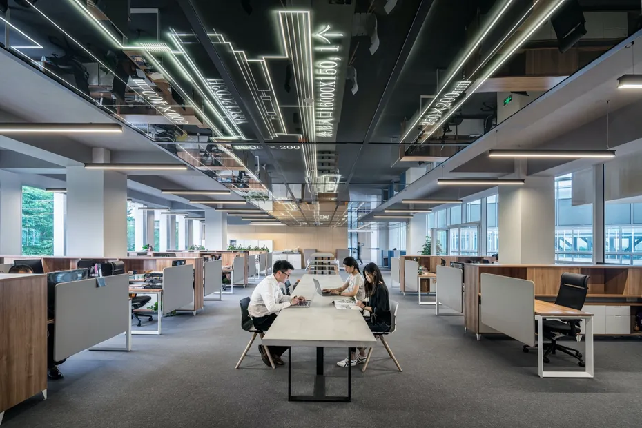 Open-plan office with team members at work